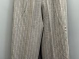 a close up of a pair of pants hanging on a wall