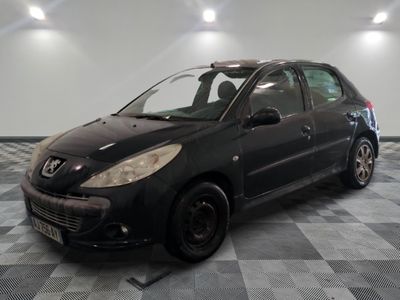 a picture of a black car parked in a garage