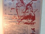 a poster on the wall of a restaurant with a picture of a man riding a horse