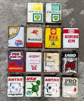 a lot of different types of gas cans on the ground