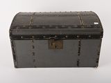 an old trunk that is sitting on a table