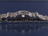 a close up picture of a watch on a table