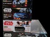 three star wars action figures on display in the box