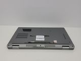 a laptop that is sitting on a white table