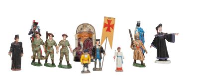 many figurines of different people standing together