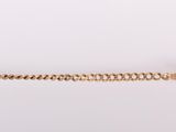 an image of a gold bracelet with a square clasp on a white background