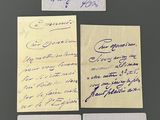 four pieces of paper with handwriting on them sitting on a table