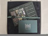 a box that has some cards and a brochure in it