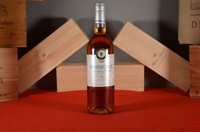 a bottle of wine that is sitting on a table