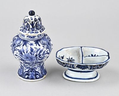 a blue and white bowl and a blue and white vase
