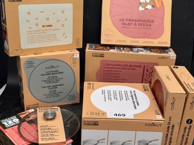 several boxes of various items are stacked on top of each other