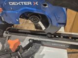 someone is using a circular saw to cut a piece of wood