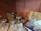 a table with a bunch of empty wine glasses on it