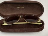 a pair of sunglasses and a pair of glasses in a case