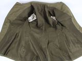 a green skirt with a zipper on the side