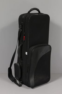 the back view of a black bag with a strap on it