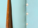 a close up of a surfboard with buttons on it