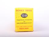 a yellow box with a sticker on it that says dinky toys