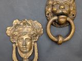 pair of antique brass lion head door knockets