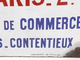 a sign that says paris 2, paris de commerce des contenteux