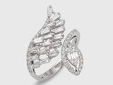 a close up of a diamond ring on a white background