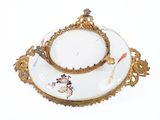 a white plate with a gold rim and a bowl on it