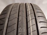a close up of a car tire with a white background