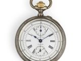 une montre de poche ancienne avec des chiffres romains sur le cadran