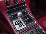 a close up of a car ' s dashboard with a number plate on it