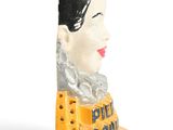 a figurine of a woman with a black hair