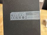 someone is holding up a card that has a sticker on it