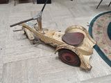 a small toy car that is sitting on the floor