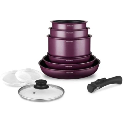 three purple pots and pans with lids on a white background