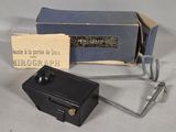 a small box with a metal handle and a small box with a metal handle