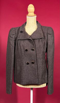 grey wool peale coat on a mannequin dummy