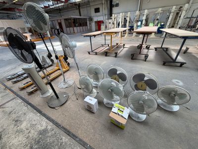 many different types of fan on the floor in the warehouse