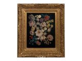 une image représentant un tableau de fleurs dans un cadre doré