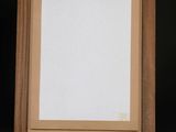 an image of a painting hanging on a wall in a room
