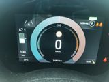 the dashboard of a car with a digital display showing the speed of the car