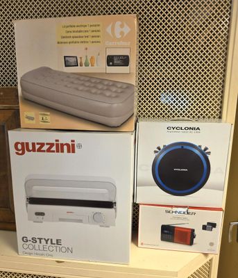 three boxes of gazzini products sitting on a shelf