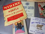 many different types of advertising items on a table