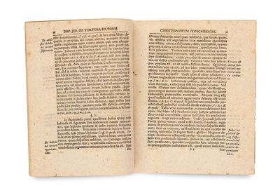 an old book open to a page of text on a white background