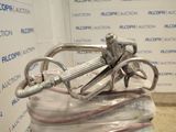 a large metal object that is sitting on top of a plastic container