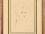 a drawing of a baby ' s head in a wooden frame