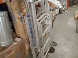 an image of a hand truck that is in a warehouse