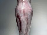 a picture of a vase that is on a table