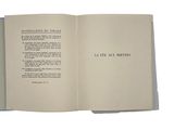 an open book with a picture of a cat on it