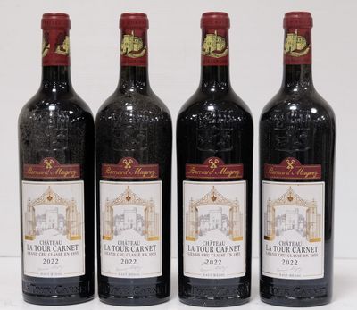 three bottles of wine are lined up on a white surface