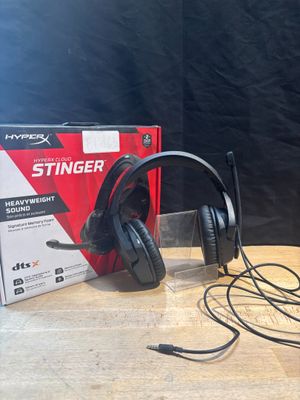 a box with a pair of headphones sitting on a table
