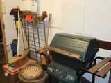 an image of a garage with a grill and other items